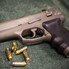 Stock_Carroll - Handgun with Bullets