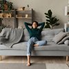 Purchased - Woman relaxing at home on the couch